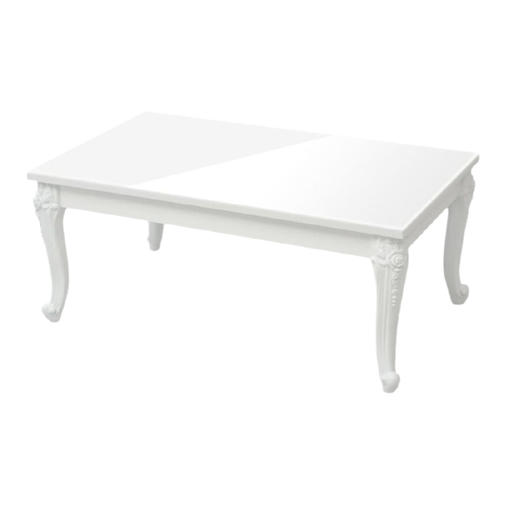 Table basse blanche en bois avec design élégant et détails sculptés.